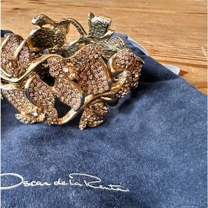 Oscar de La Renta goldtone cuff bracelet.